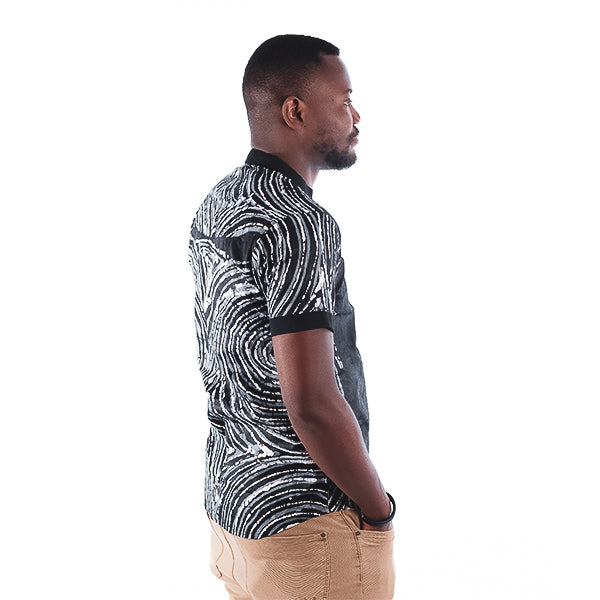 Orente fashions - Dimeji Button-Down {Black}.This #African shirts for men is ideal for both smart and casual occasions, transitioning from the office to an evening out. Pair with jeans or smart pants for a look unique to you.