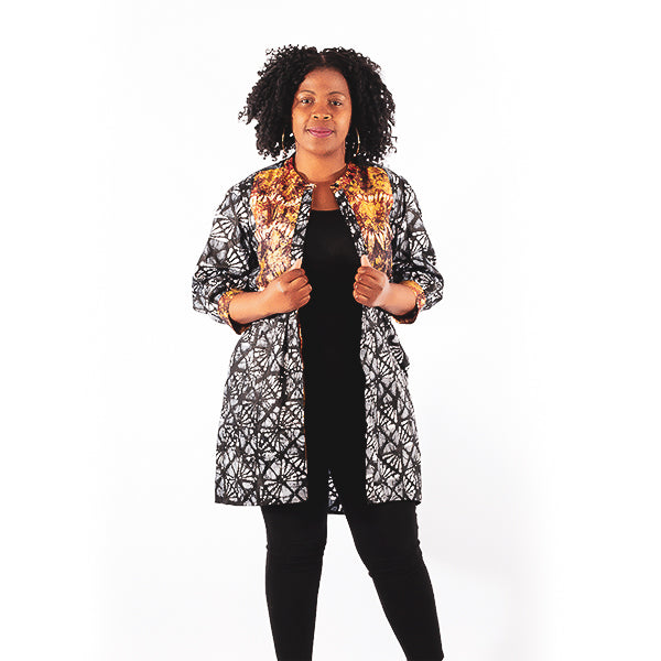 Orente fashions - Kemi Shirt Dress {Brown-Black}. This shirt dress has been designed for tight fit on the waist and loose on the hips. Can be worn buttoned with a pair of tights and heels or cute sandals.