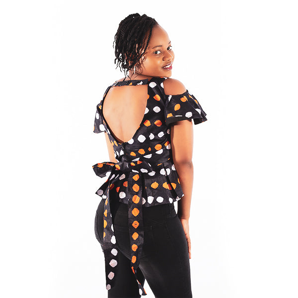 Orente fashions - Moyo Open Back Top {Brown}. This sleeveless open back top is fun, sexy and a must have in your summer closet! This top is perfect for a night out to the dance floor. Very versatile, can be worn with a skirt, jeans or some stylish shorts.