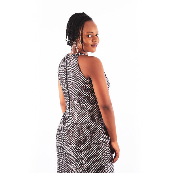 Orente fashions - Timi Halter Dress {Brown}. This halter dress is perfect for date nights. The Timi halter dress is elegant and sexy, leaving you feeling like a queen all night. Complete the look with a pair of heels or sandals.