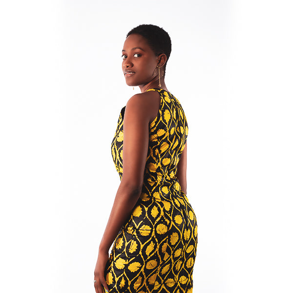 Orente fashions - Timi Halter Dress {Brown}. This halter dress is perfect for date nights. The Timi halter dress is elegant and sexy, leaving you feeling like a queen all night. Complete the look with a pair of heels or sandals.