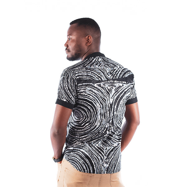 Orente fashions - Dimeji Button-Down {Black}.This #African shirts for men is ideal for both smart and casual occasions, transitioning from the office to an evening out. Pair with jeans or smart pants for a look unique to you.